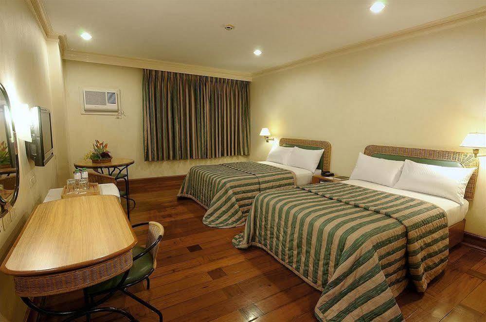 The Legend Palawan Hotel Puerto Princesa Bagian luar foto